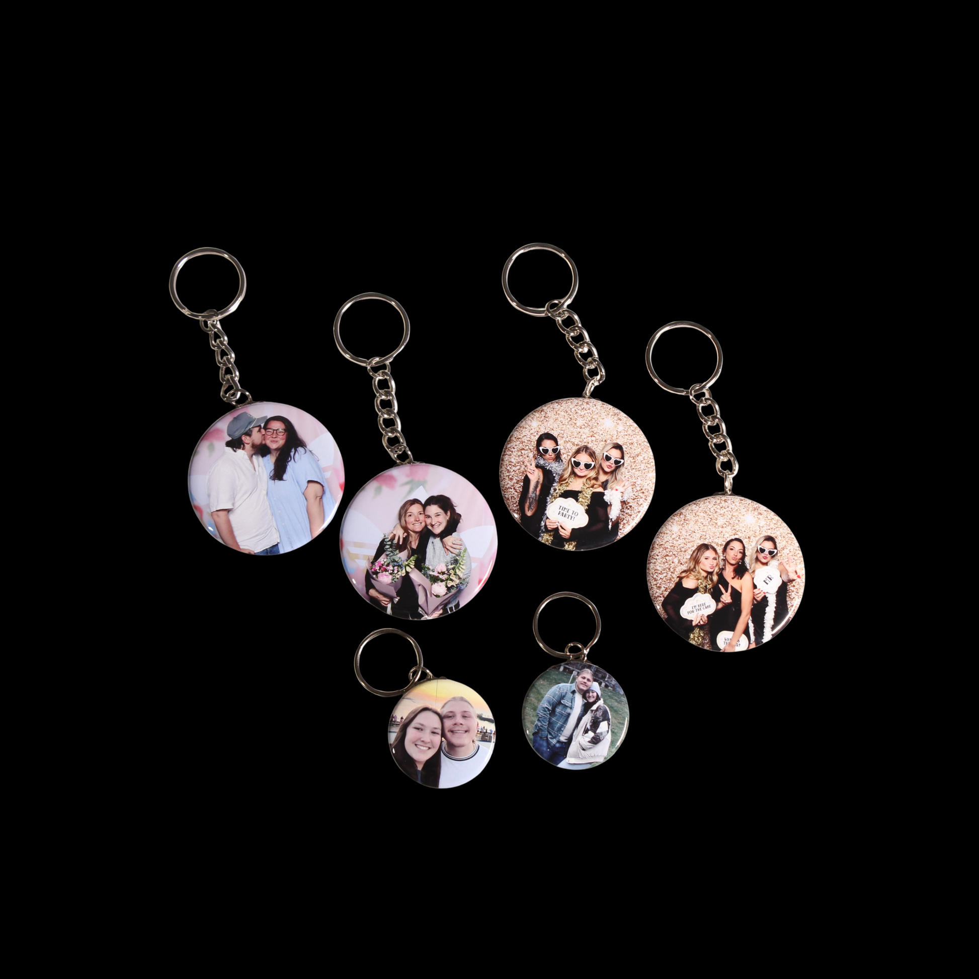 Different sized Custom Photo Keychains showing couples kissing, smiling, and having fun at a party